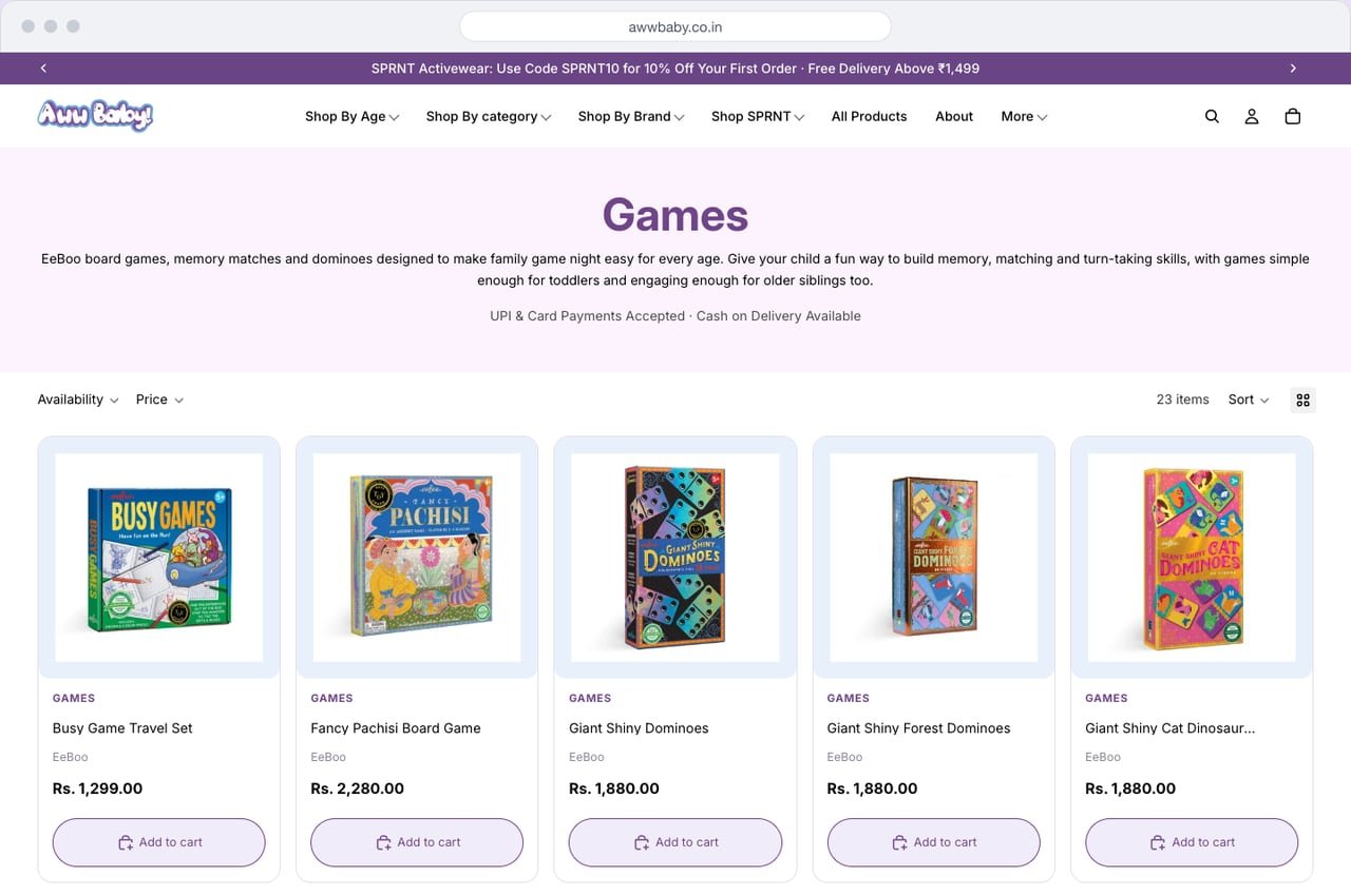 AwwBaby Games category page on desktop with filters, sort and product cards showing brand, price and add to cart